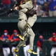 Padres catcher Victor Caratini jumps into Musgrove’s arms after final out.